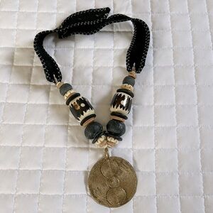 Twine & Twig mud bead and brass necklace